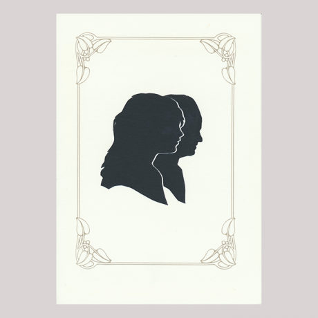 
        Front of silhouette, with woman and man looking right. Close-up the woman; in the background the man.